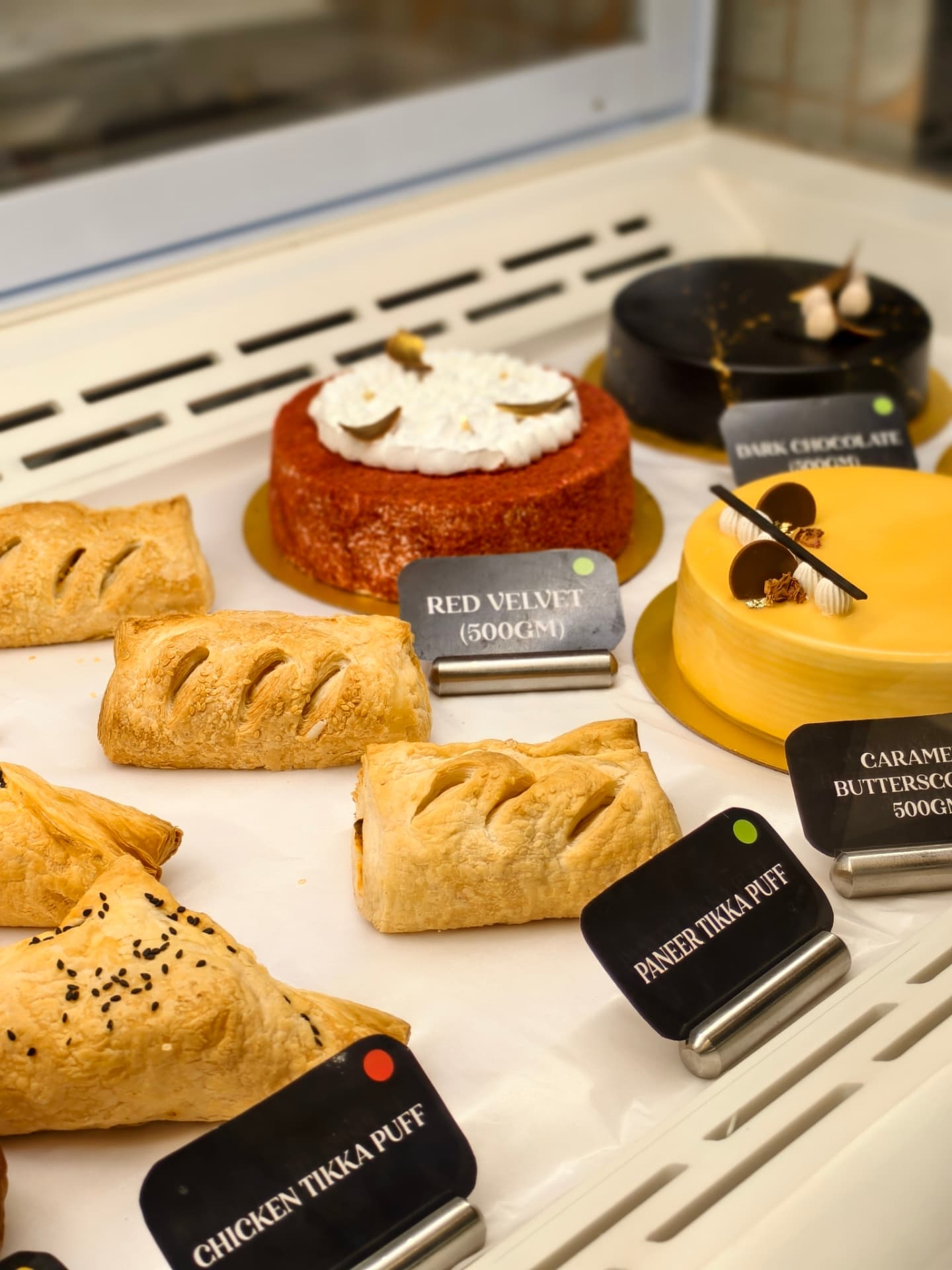 Cakes and pastries inside O’Co’s chilled display