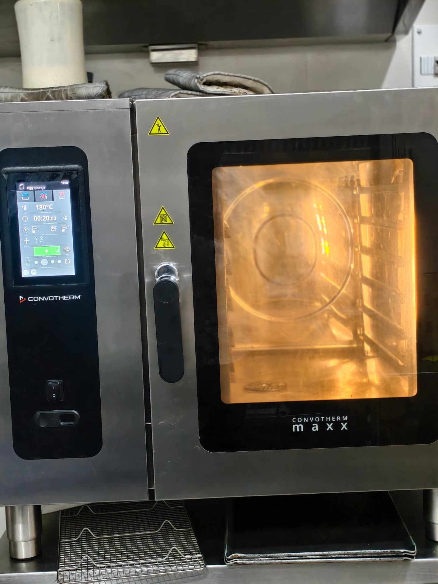 An illuminated oven inside the O’Co kitchen